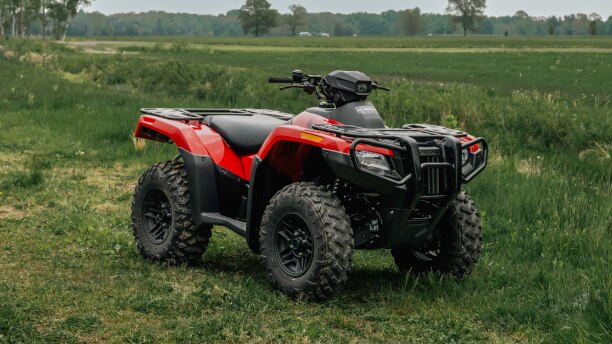 A parked Rubicon in a field