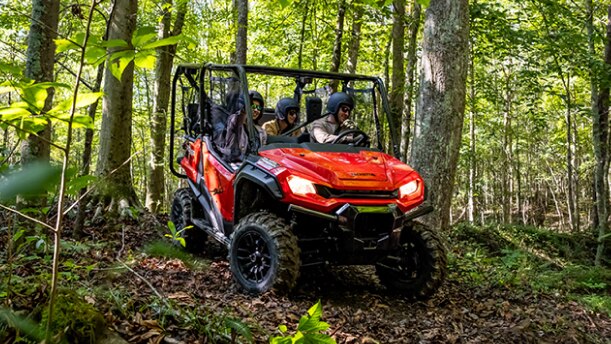 A rider in a Honda SxS